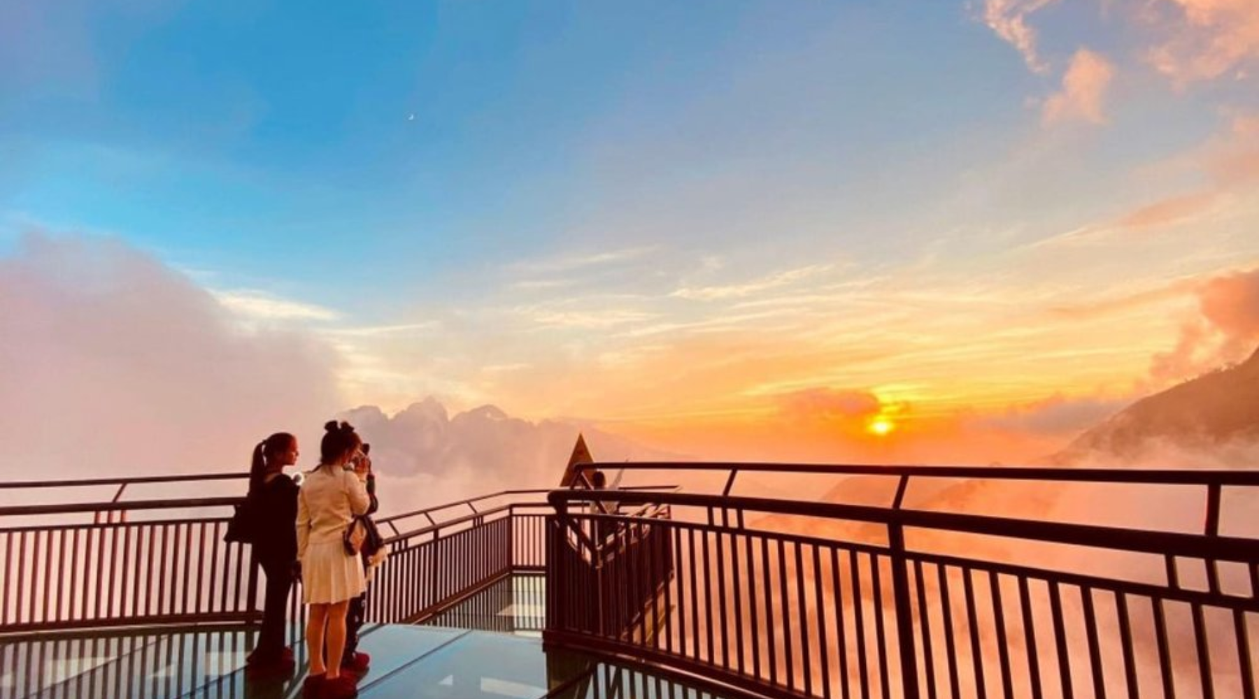 Watching the sunset from the glass bridge