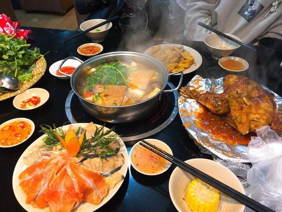 Salmon hotpot and grilled specialties from Sapa