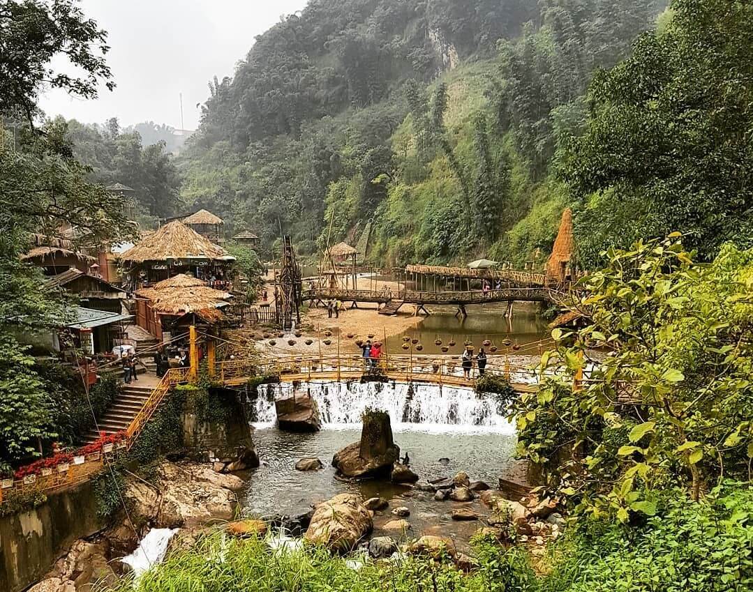 Stone walking path winding through a traditional village