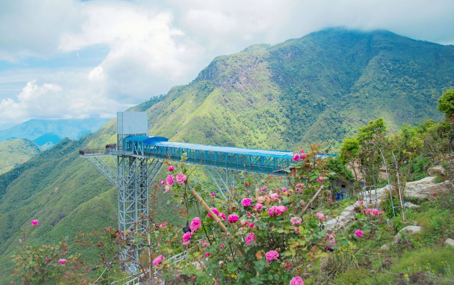 Dragon Cloud Glass Bridge overlooking the Hoang Lien Son mountain range in Sapa