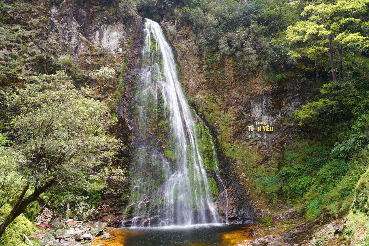 Love Waterfall surrounded by forest in Hoang Lien National Park