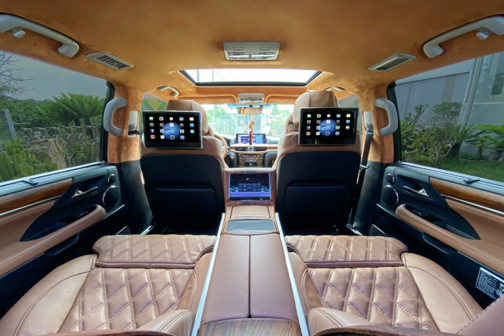 Luxury limousine van interior with comfortable seats