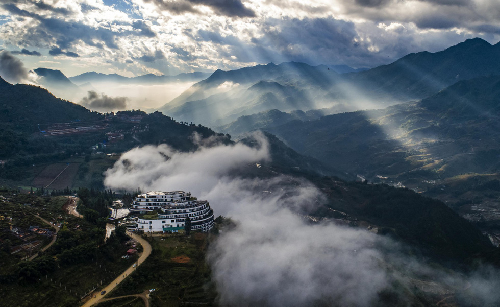 panoramic mountain landscape near Sapa heaven gate with clouds and peaks