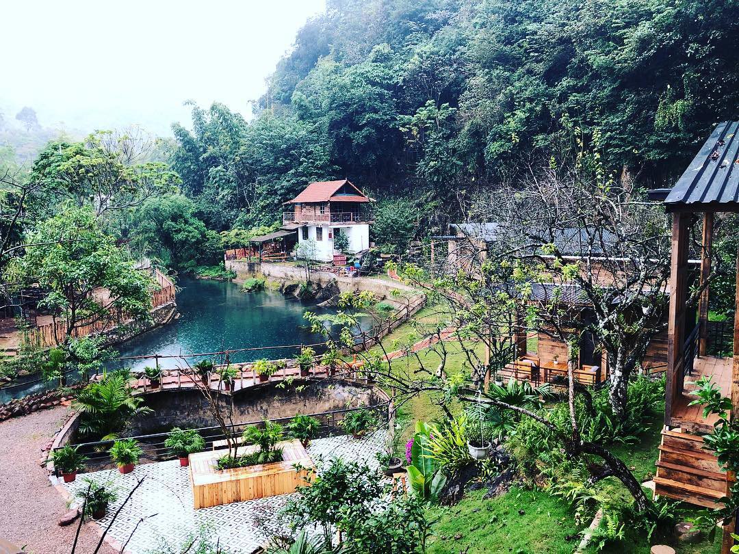 Wooden stilt house used as a homestay in a peaceful village